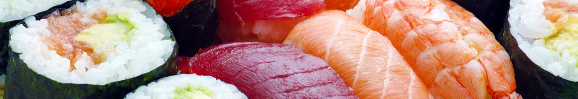 Eating Sushi at OEC Revolving Sushi Bar restaurant in Anchorage, AK.